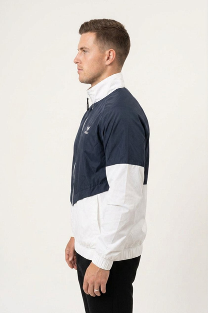 Side view of men’s navy and white two-tone lightweight windbreaker with raised collar