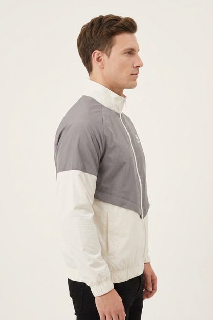 Side view of men’s grey and white two-tone windbreaker jacket with full front zipper